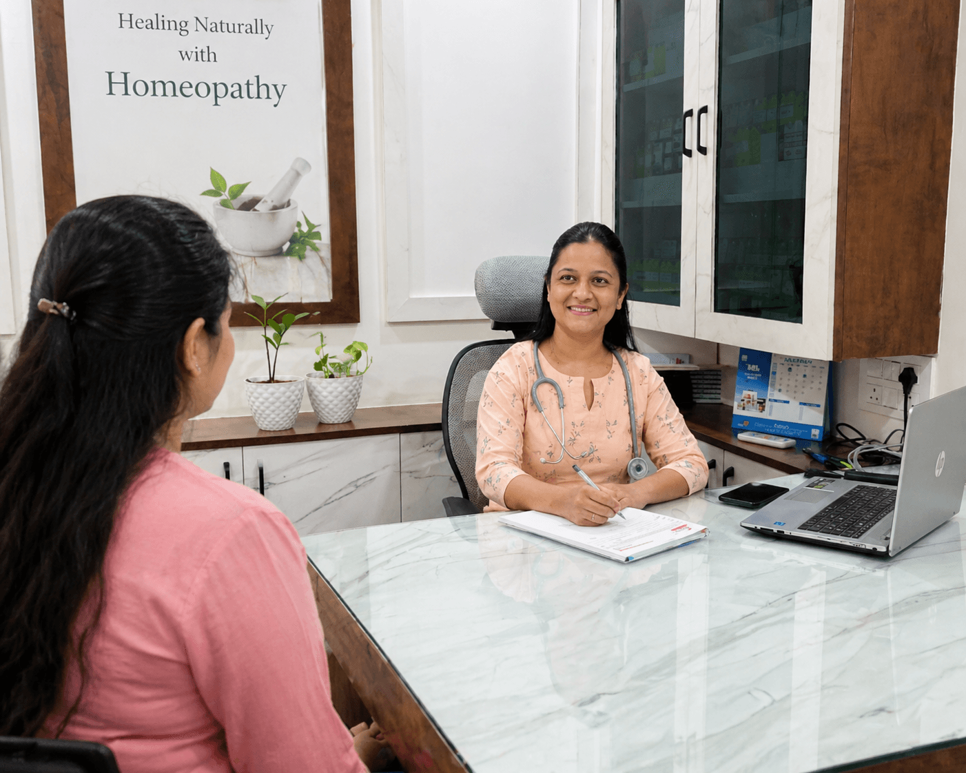 Dr Shital Bankar homeopathy consultation with patient in Wakad Pune